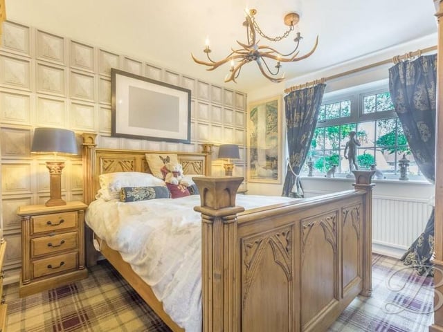 Of the three bedrooms, one of them sits downstairs, while two can be found on the first floor, including this master. As you can see, it is a majestic space, with a window facing the side of the property.