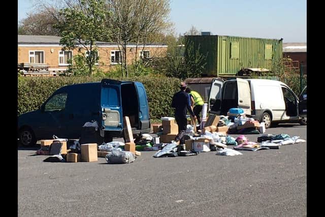 A picture taken from the Hermes Mansfield depot shows parcels scattered on the ground outside.