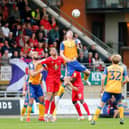 Oli Hawkins wins this header at Leyton Orient. Pic by:  Chris Holloway/The Bigger Picture.media