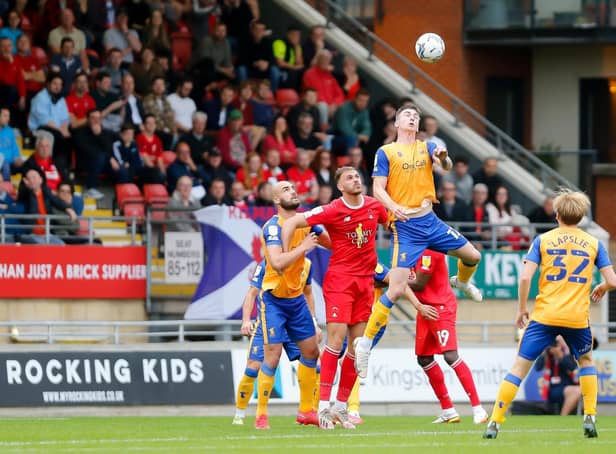 Oli Hawkins wins this header at Leyton Orient. Pic by:  Chris Holloway/The Bigger Picture.media