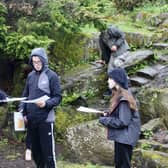 Two Counties students outdoors finding orienteering clues