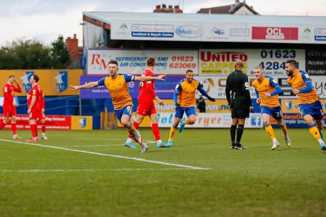 Mansfield Town midfielder Ollie Clarke celebrates his second half strike. Photo by Chris Holloway/The Bigger Picture.media