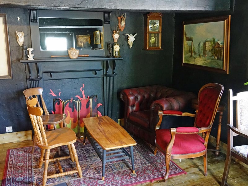 Plenty of eye-catching items in the snug, which has a low ceiling.