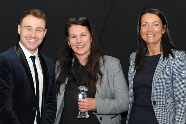 Liz Barrett pictured at the Ashfield Community Awards receiving her Ashfield Citizen of the Year award, which was presented by Theresa Hodgkinson from Ashfield District Council and paralympic athlete Ollie Hynd.