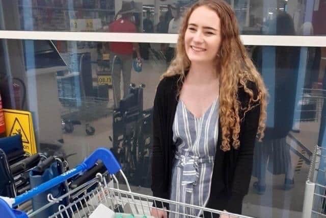 Ellie Haywood, 16, at Tesco with their kind donations.