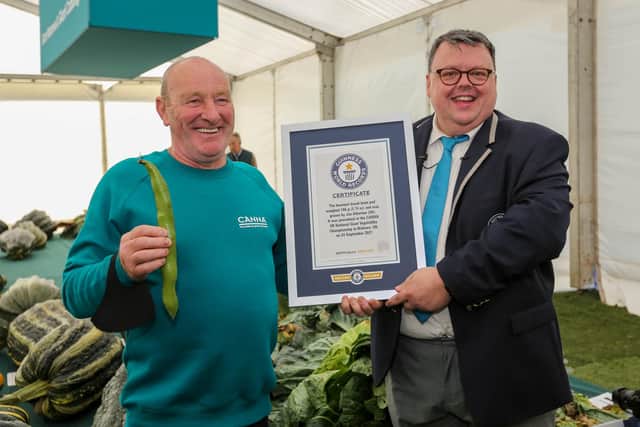 The heaviest broad bean pod was grown by Joe Atherton (left). He  received his Guinness World Record from Craig Glenday at the Three Counties Malvern Autumn Show.  Photos by Anna Lythgoe