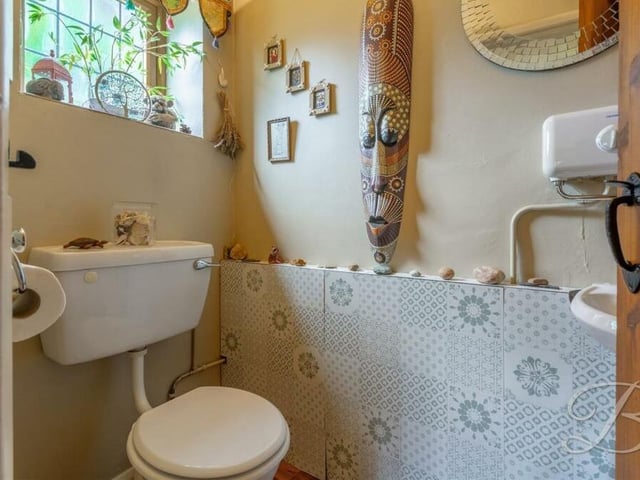 The last ground-floor room to take a look at is the downstairs toilet, complete with low-flush WC and wash hand basin.