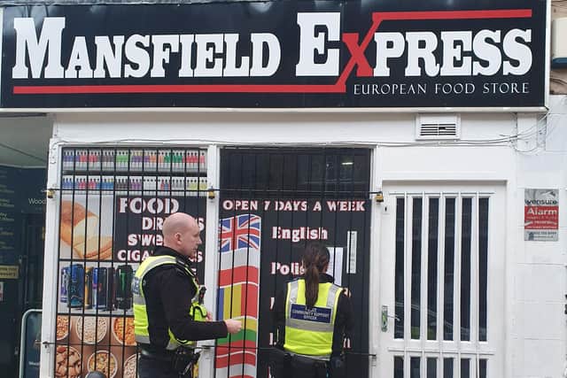 Police officers at Mansfield Express.