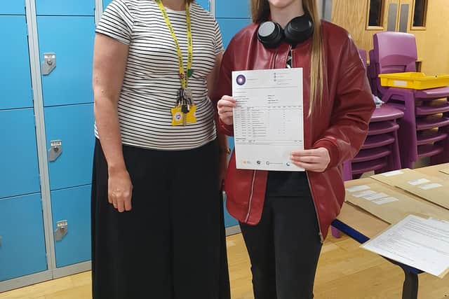 Jen Richardson, head of Year 11, with Porsche Cane who achieved three grade 9s, four grade 8s and a Distinction* and hopes to continue her studies at Sutton Community Academy Sixth Form.