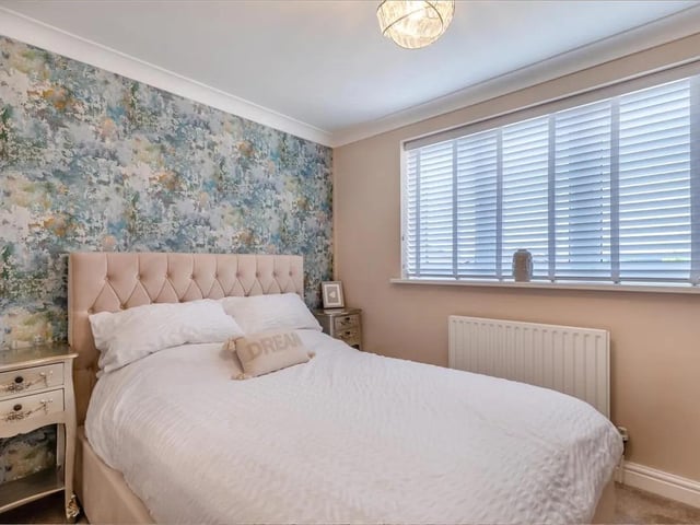One of five stylishly decorated bedrooms in the property.