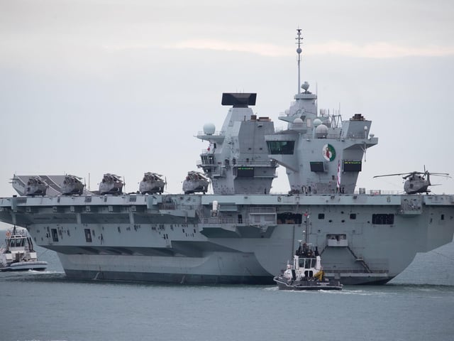 The Royal Navy aircraft carrier HMS Queen Elizabeth leaves Portsmouth. Picture: Andrew Matthews/PA Wire