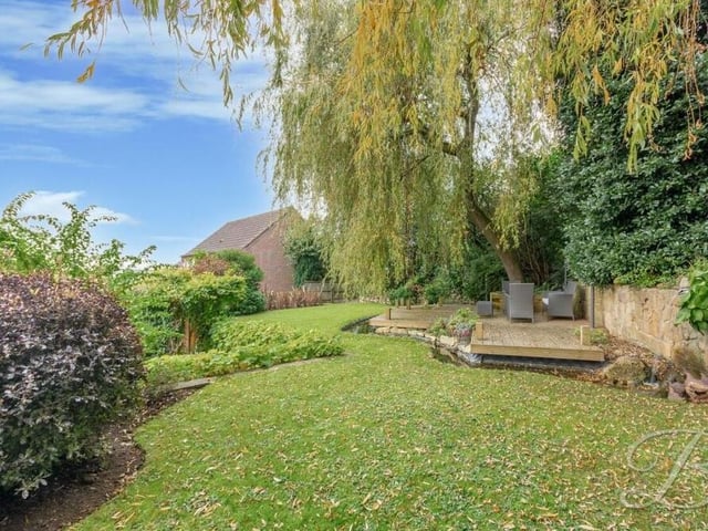 Blue sky meets green lawn in the stress-free Church Hill garden.