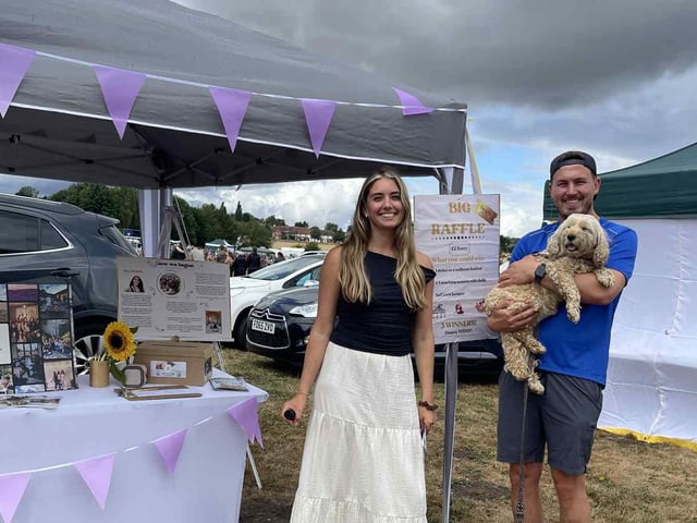 Holly promoted her True Self Care Club at the carnival, with help from friends, including Maggie the dog.