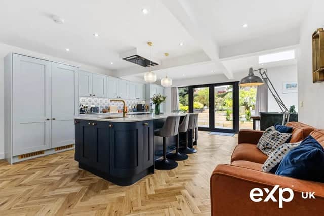 The vast open-plan kitchen diner achieves top-end luxury.