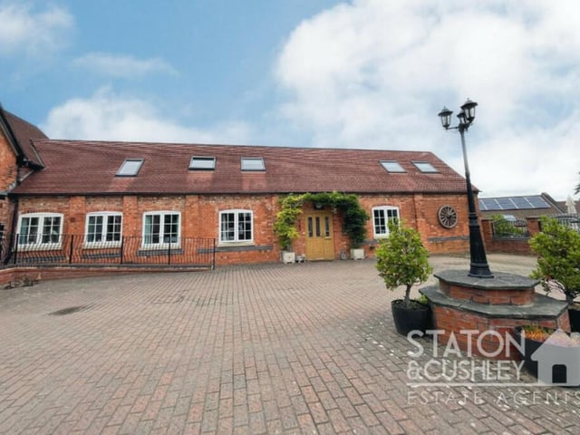 Another shot of the courtyard in which the Mansfield Woodhouse property sits. It is surrounded by a handful of exclusive homes and open fields.