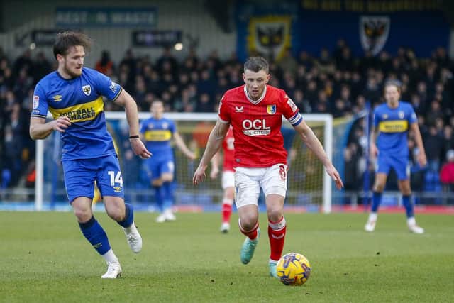 Mansfield Town midfielder Ollie Clarke (08) during the Sky Bet League 2 match against AFC Wimbledon at Cherry Red Records Stadium, 27 Jan 2024 
Photo Chris & Jeanette Holloway / The Bigger Picture.media