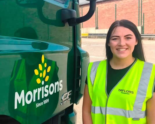 Charity hero Lauren Warner, of Taylor's, taking delivery of Rotary4foodbanks stock from Morrisons.