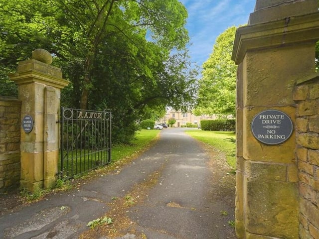 This gated entrance gives access to the grounds of Manor House and a private driveway that leads to your apartment.
