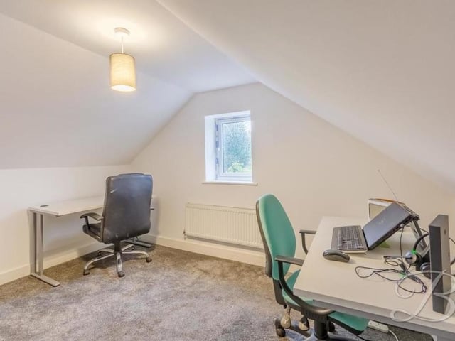 The fifth bedroom at the property can be found on the second floor. As our photo shows, it could easily be turned into a home office or study.