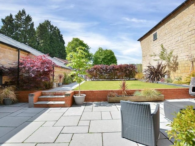 Another photo of the rear garden. There is plenty of room for attractive plants and shrubs.