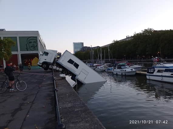 The lorry plunged into the harbour this morning.
