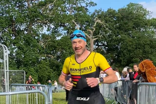 Daniel Wilson in transition between swim and run at Holkham