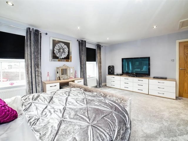 The property features 4 bedrooms, perfect for a growing family.