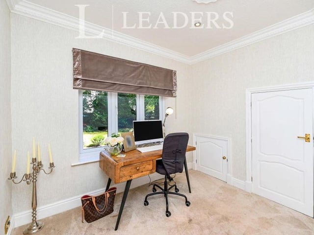 The high-quality specification of the Ravenshead house continues in this cosy study. The room also boasts a storage cupboard.