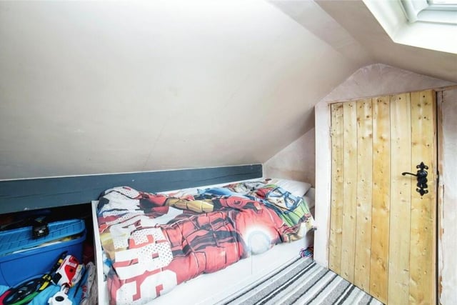 Here is the first of two rooms in the attic that can easily be converted into children's bedrooms.
