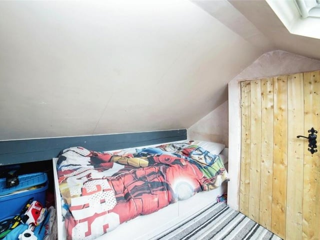 Here is the first of two rooms in the attic that can easily be converted into children's bedrooms.