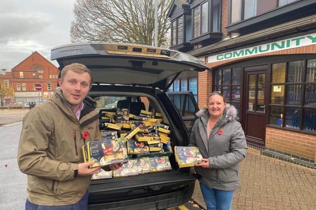 Councillor Tom Hollis and Samatha Deakin deliver a car load of mince pies to the Sutton Community Foodbank.