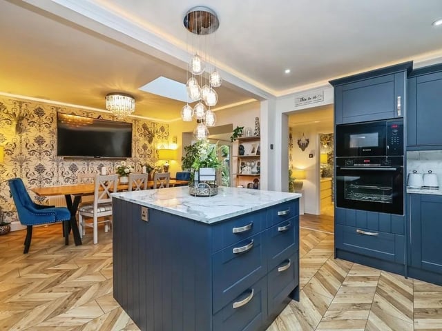 No expense has been spared in creating this breathtaking three-bedroom detached bungalow, ideally located in the highly sought-after area of Berry Hill on Chatsworth Drive. At the heart of the home is a stunning kitchen-dining room, equipped with top-spec integrated appliances and a feature island. Open access leads into a sunroom, which benefits from French doors opening onto the garden, seamlessly merging indoor and outdoor living.