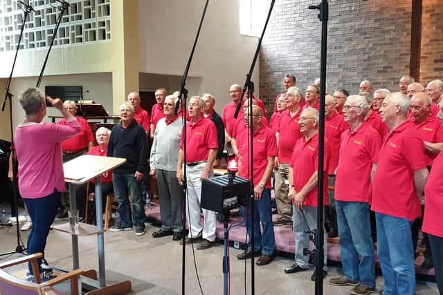 The choir recording a CD for its centenary in 2019.