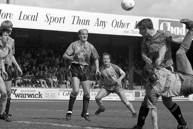 Phil Stant tries an overhead kick.