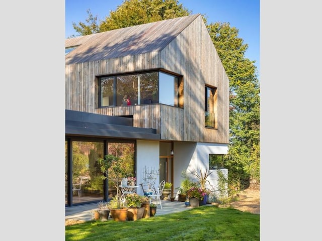 An exterior view of the Kebony-clad new family home in Braishfield, Hampshire.