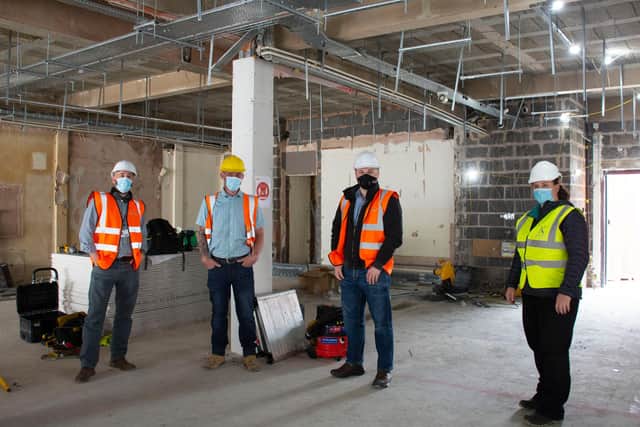 Phil Clark, assistant head of construction at Vision West Notts College, Nick Drury, site manager, Coun Mathew Relf and Katie Mills, project manager, pictured as work gets underway at Kirkby's new indoor market