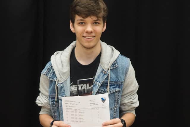 Jamie Barrowcliffe celebrates his GCSE results.