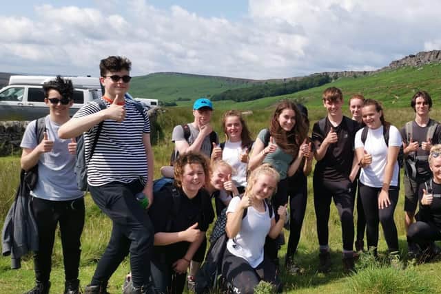 The students took part in an expedition in the Peak District to raise funds.