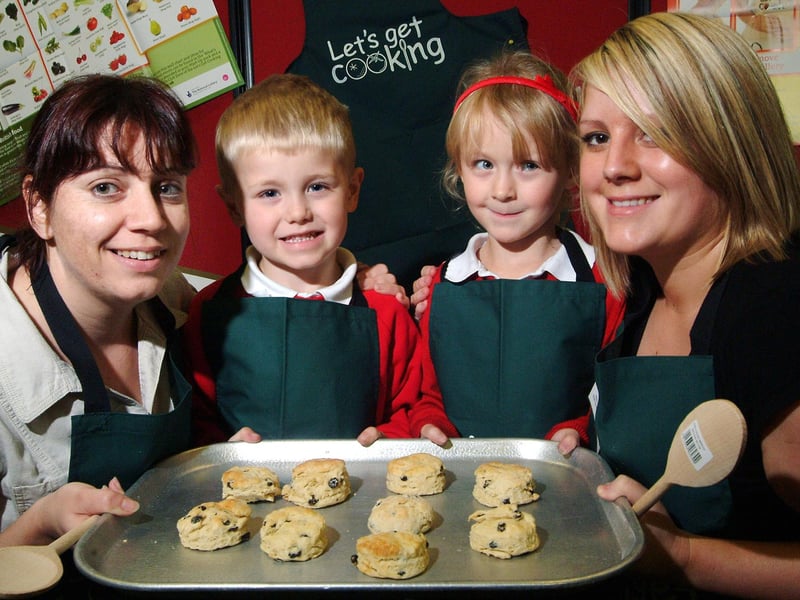 Cooking demonstrator, Sharon Granger, left, Dillon Hayes, Leah Rouse and club co-ordinator Sarah Barlow, show off some of the ones they made during a taster session for a cooking club at Selston Infant and Nursery School in January, 2009.