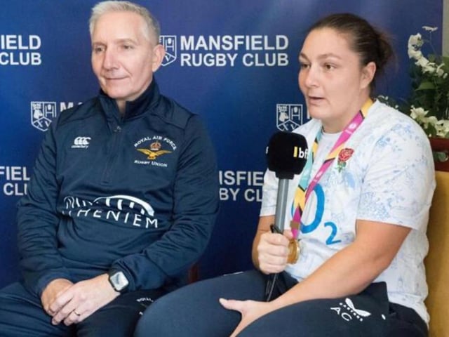 Rugby World Cup Winner Amy Cokayne and her father Ian being interviewed by British Forces Broadcasting Service