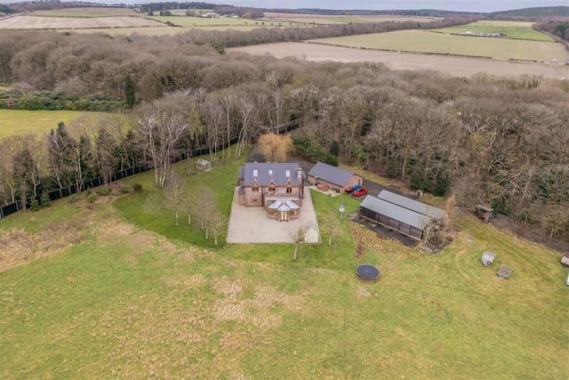 Extensive woodland provides a stunning backdrop for the £1.5 million Papplewick property.