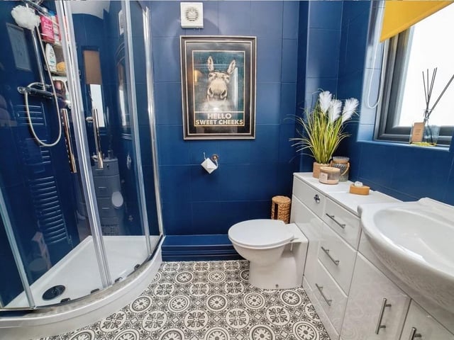The master suite benefits from an en-suite.