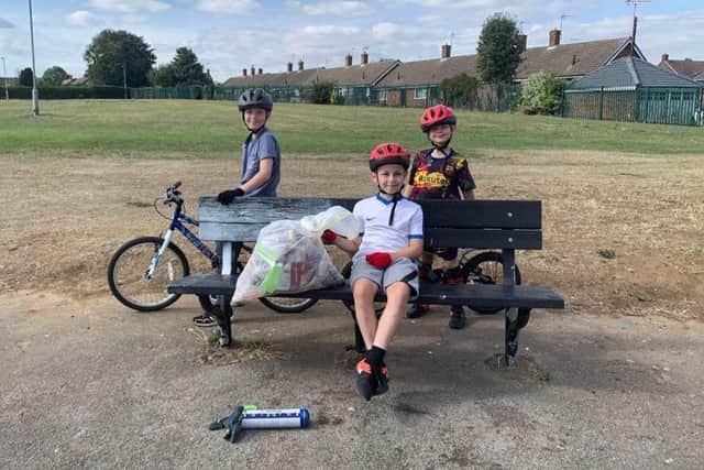 Brothers - Sam, Joe and Blake Adey after a litter-picking session at Ladybrook Park.