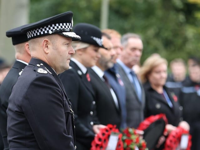 Police officers marking Armistice Day at the Nottinghamshire force headquarters