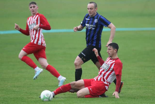 Selston's Carl Moore (in blue) will be among those looking to cause a shock.