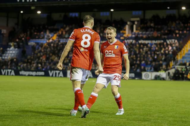 Ollie Clarke celebrates with Louis Reed at Stockport
Photo: Chris & Jeanette Holloway / The Bigger Picture.media