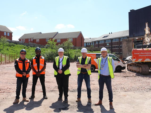 Marking the demolition are (from left) Gary Cross and Richard Stanbury from Total Reclaims Demolition, and Gavin Peake, Nigel Bryan and Adam Thompson from West Nottinghamshire College.