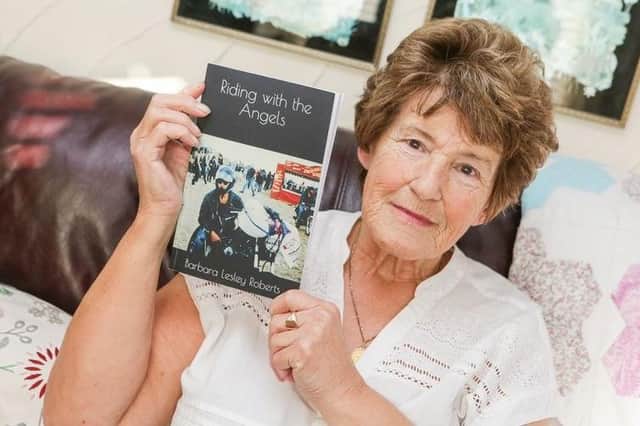 Barbara Roberts with her book 'Riding with the Angels'.