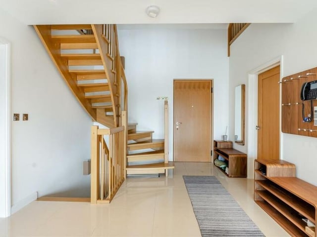 Back to the entrance hall now at the £700,000 property.; Via the oak winding staircase, we are going to take a look at the lower ground floor and then the first floor.