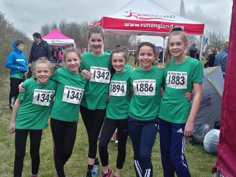 These Harriers girls pose for a pic before racing. Does this bring back any memories for you?